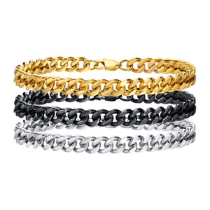 Close-up of three Cuban link bracelets in gold, black, and silver stainless steel