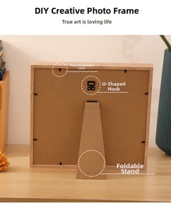 Detailed view of the back of a DIY wooden frame with support stand and metal hanging hooks