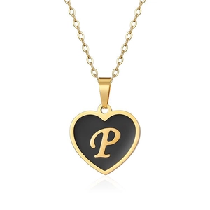 Detail of gold heart pendant with black enamel inlay and letter P on O-chain necklace