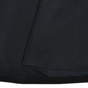Close-up of high-quality black fabric texture with detailed weave for elegant dress