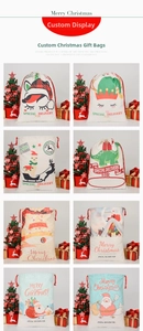 Detail view of 8 large Christmas canvas drawstring gift bags with festive character prints