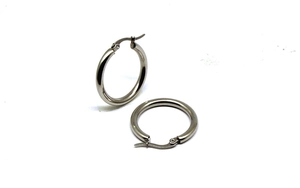 Close-up of polished 316 stainless steel hoop earrings with secure pin closure for women