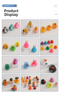 Collection of various themed rubber ducks including pirate, sports, and colorful animal patterns