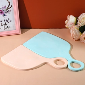 Detail of minimalist silicone tray resin mold with matte finish in pink and blue colors