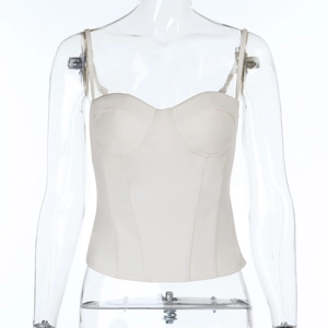 Detailed front view of a white corset-style camisole top with structural chest seams