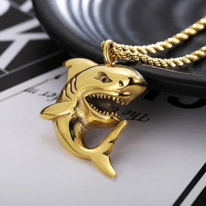 Golden shark shaped pendant necklace with twisted chain in polished stainless steel
