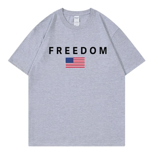 Grey cotton T-shirt featuring FREEDOM text and American flag print in a flat lay view
