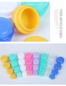 Macro detail of various colorful mushroom cream jars showing screw lids and threaded necks
