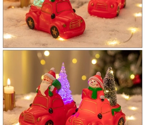 Close-up of red Christmas car light with Santa and Snowman in a warm snowy holiday setting