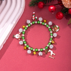 Detailed close-up of a festive Christmas bracelet with reindeer and snowflake charms