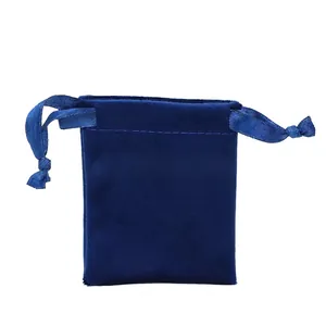 Detail of soft navy blue velvet drawstring pouch for jewelry storage and gift packaging