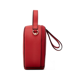 Side view of red Saffiano leather handbag featuring golden hardware and top handle
