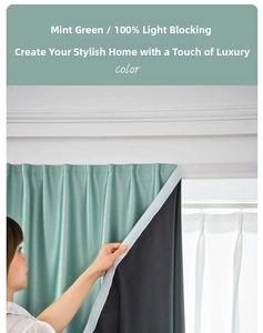 Detail of mint green blackout curtain showing dual-layer fabric and high shading effect