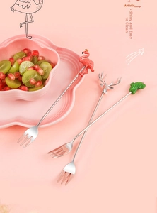 Detailed view of creative 304 stainless steel dessert forks with cartoon flamingo and deer heads
