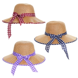 Three straw sun hats with polka dot bow ribbons in burgundy, navy blue, and purple hues