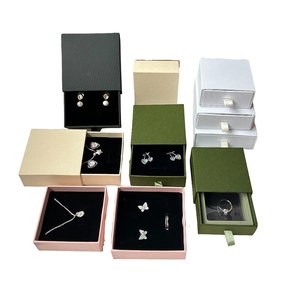 Variety of colorful jewelry boxes with pull-out drawers for necklaces rings and earrings