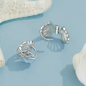 Elegant 925 sterling silver shell earrings with blue enamel and starfish detail