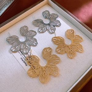 Vintage hollow flower and leaf stud earrings in silver and gold metallic finish