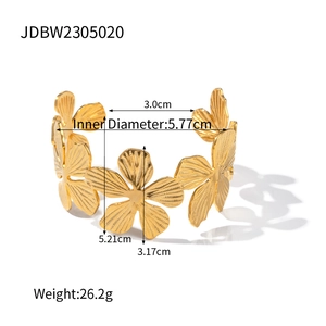 Detailed dimensions of gold titanium flower cuff bracelet with 5.77cm inner diameter