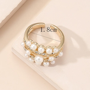 Detailed view of adjustable gold pearl ring with a precise 1.8cm inner diameter measurement