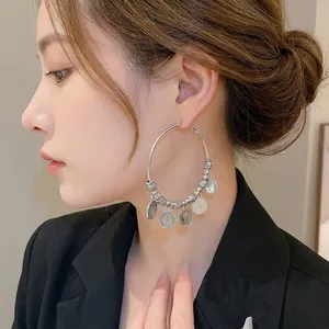 Vintage geometric silver coin tassel hoop earrings with portrait engraving for women