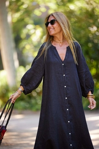 Close-up of black cotton linen maxi dress featuring v-neckline and button-down detail