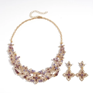 Luxury gold flower necklace and earring set with violet crystals and rhinestones