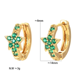 Detail view of gold star hoop earrings with green zircon and size measurements