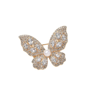 Elegant gold-tone butterfly brooch with sparkling crystals and white pearl accent