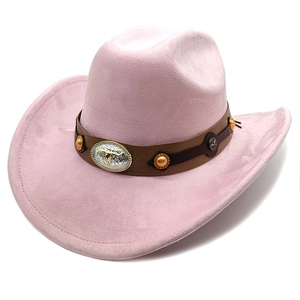Pink suede cowboy hat detail featuring a brown leather band and embossed silver bull head buckle
