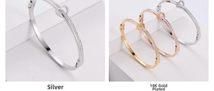 Detail of heart buckle bangle with rhinestones and Love Forever engraving