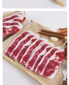 Realistic raw pork belly stone pendants with natural marbling texture and lanyard