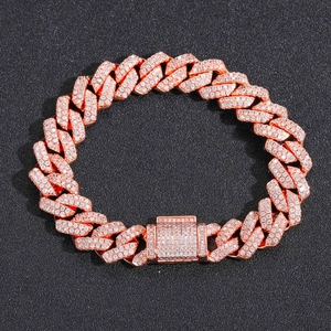 Men's 14mm rose gold Cuban link necklace with sparkling cubic zirconia on black texture