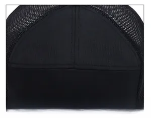 Detailed view of breathable black mesh fabric and shield logo on the baseball cap top