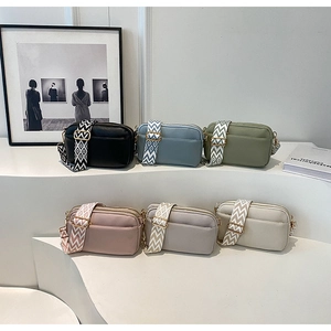 Collection of minimalist PU leather crossbody bags with colorful geometric wide straps