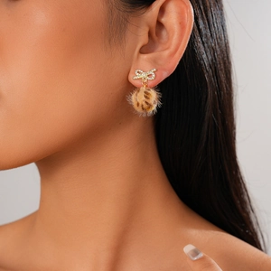 6-piece set of gold bow earrings with leopard print fur balls and rhinestone accents