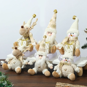 Set of 6 gold and cream knit Christmas ornaments including Santa, reindeer, and snowmen