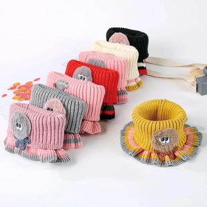 Knitted kids winter neck warmer with cute cartoon eyes and colorful striped ruffles