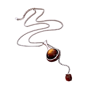 Collier en argent ajustable avec pendentif goutte évidé et incrustation d'oeil de tigre