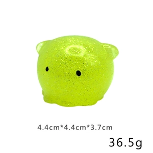 Detail view of octopus mochi squishy toy with glitter measuring 4.4x4.4x3.7cm and 36.5g