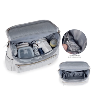 Detail view of large capacity diaper bag with thermal insulation and organized compartments