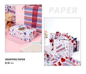 Detail of Happy Birthday wrapping paper featuring red stars and hearts on white background