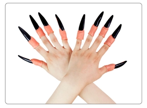 Detailed view of ten long black pointed witch fingernail claws for Halloween cosplay