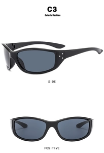 Y2K futuristic cycling sunglasses detail with silver rivet accents and grey-blue lenses