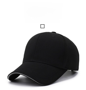 Close-up of black cotton baseball cap with classic six-panel design and brim piping details
