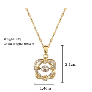 Detailed view of a gold heart pendant with dimensions and weight specifications