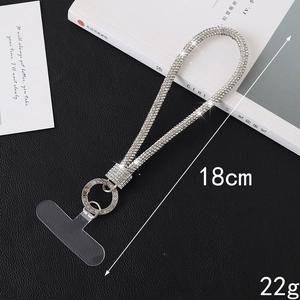 Silver rhinestone phone lanyard detail with metal ring and clear clip, 18cm long