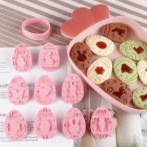 9-piece Easter themed cookie cutter set with rabbit and egg patterns for baking