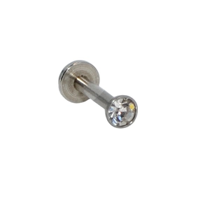 Surgical stainless steel labret stud with a clear sparkling crystal on a white background