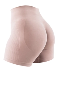 Close-up of high-waist seamless yoga shorts with push-up texture and peach butt lift design
